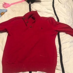 red polo sweater